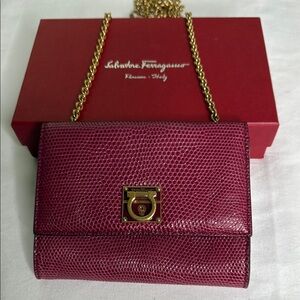 Salvatore Ferragamo Burgundy Leather Clutch with Gold Chain